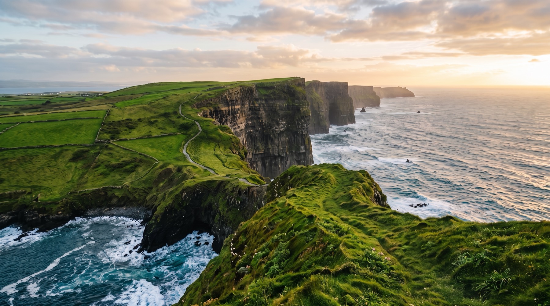 Ireland's coastline and cliffs bathed in golden light